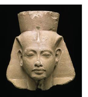 Tutankhamen wearing a nemes headdress